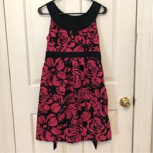 Motherhood maternity dress with pink flower pattern and black accents